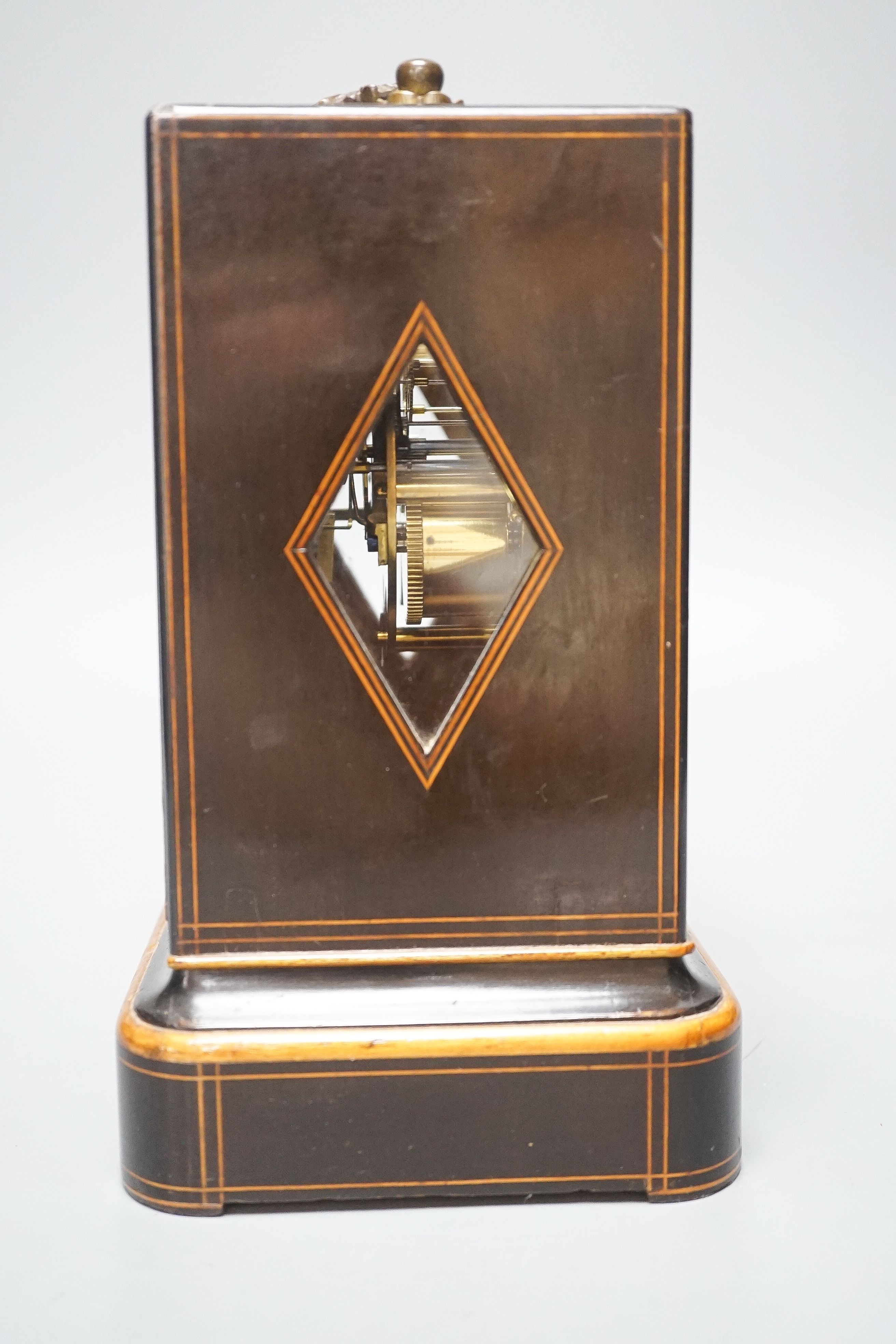 A 19th century French mahogany cased mantel clock, key and pendulum